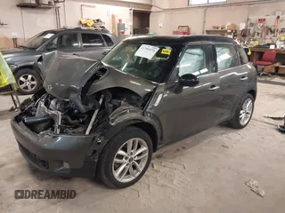 2012 MINI Countryman S with VIN WMWZC3C59CWL83491, listed as a IAAI auction lot 41791573 with 115,355 mi miles and . Bid and sale history available at DreamBid. Image 2.