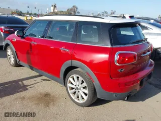 2016 MINI Cooper Clubman with VIN WMWLN5C58G2E30425, listed as a IAAI auction lot 41955202 with 100,798 mi miles. Bid and sale history available at carsss.com. Image 3.