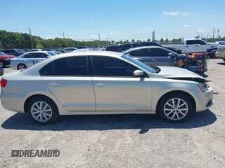 2011 Volkswagen Jetta Sedan SE w/Convenience & Sunroof with VIN 3VWDX7AJ9BM316541, listed as a IAAI auction lot 42037920 with 83,658 mi miles. Bid and sale history available at carsss.com. Image 13.