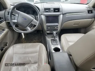 2010 Ford Fusion Hybrid with VIN 3FADP0L36AR203663, listed as a Copart auction lot 60310095 with 211,922 mi miles and Salvage title. Bid and sale history available at DreamBid. Image 8.
