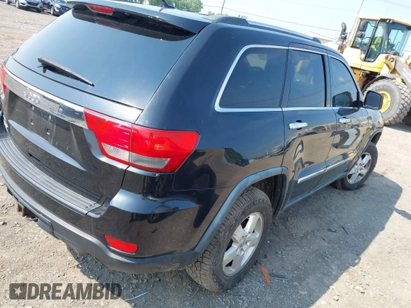 2011 Jeep Grand Cherokee Laredo with VIN 1J4RR4GG1BC534787, listed as a IAAI auction lot 42486840 with 186,229 mi miles and . Bid and sale history available at DreamBid. Image 4.