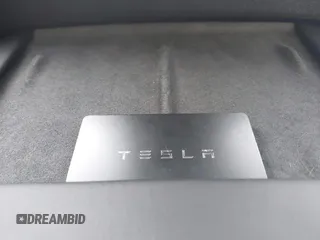 2021 Tesla Model 3 Performance with VIN 5YJ3E1EC5MF919278, listed as a IAAI auction lot 40194677 with 50,484 mi miles and . Bid and sale history available at carsss.com. Image 11.