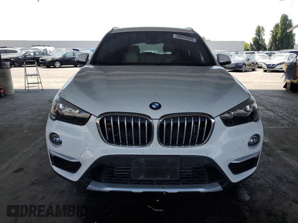 2017 BMW X1 xDrive28i with VIN WBXHT3C35H5F73546, listed as a Copart auction lot 59544545 with 125,185 mi miles and Salvage title. Bid and sale history available at DreamBid. Image 5.