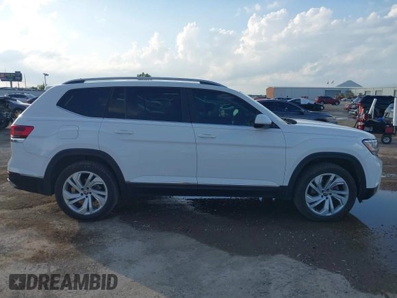 2021 Volkswagen Atlas SEL with VIN 1V2BR2CAXMC522670, listed as a IAAI auction lot 42110724 with 58,802 mi miles and . Bid and sale history available at DreamBid. Image 13.