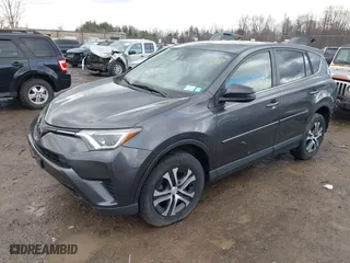 2018 Toyota RAV4 LE with VIN JTMBFREV8JJ184809, listed as a IAAI auction lot 41901048 with 76,699 mi miles. Bid and sale history available at carsss.com. Image 18.