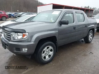 2012 Honda Ridgeline RT with VIN 5FPYK1F24CB456298, listed as a IAAI auction lot 40869948 with 123,329 mi miles and . Bid and sale history available at DreamBid. Image 2.