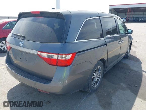 2011 Honda Odyssey EX-L with VIN 5FNRL5H69BB092752, listed as a IAAI auction lot 42245534 with 142,718 mi miles and . Bid and sale history available at DreamBid. Image 4.