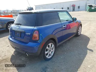 2008 MINI Hardtop with VIN WMWMF33528TT61214, listed as a IAAI auction lot 42054321 with 126,006 mi miles and . Bid and sale history available at DreamBid. Image 4.