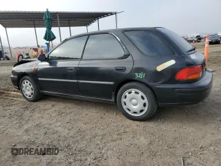 1998 Subaru Impreza L with VIN JF1GF4354WG805257, listed as a Copart auction lot 73696134 with 141,441 mi miles and Salvage title. Bid and sale history available at DreamBid. Image 2.