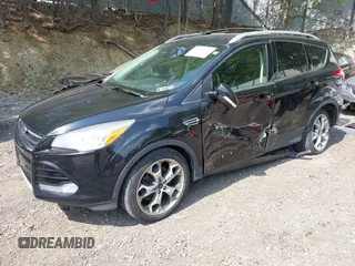 2016 Ford Escape Titanium with VIN 1FMCU9JX1GUC18335, listed as a IAAI auction lot 42396492 with 147,522 mi miles and . Bid and sale history available at DreamBid. Image 2.