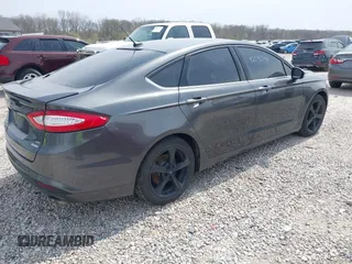 2016 Ford Fusion SE with VIN 3FA6P0HD3GR380223, listed as a IAAI auction lot 42040598 with 106,909 mi miles. Bid and sale history available at carsss.com. Image 4.