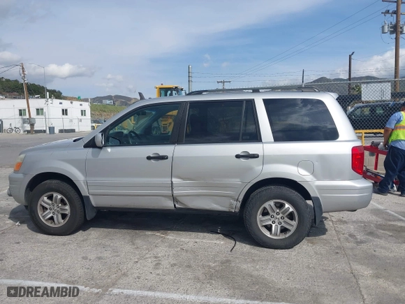 2005 Honda Pilot EX-L with NAVI with VIN 2HKYF18755H552502, listed as a IAAI auction lot 41921122 with 187,904 mi miles. Bid and sale history available at carsss.com. Image 14.