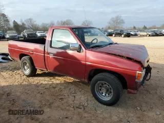 1997 Nissan Frontier XE with VIN 1N6SD11S1VC367298, listed as a Copart auction lot 43535615 with 335,353 mi miles and Salvage title. Bid and sale history available at DreamBid. Image 4.
