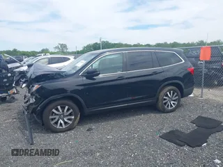 2021 Honda Pilot EX-L with VIN 5FNYF6H53MB097089, listed as a IAAI auction lot 42309359 with 58,371 mi miles and . Bid and sale history available at DreamBid. Image 15.