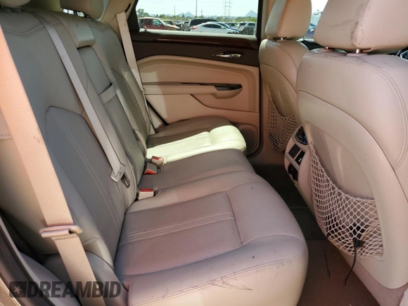 2014 Cadillac SRX Premium Collection z VIN 3GYFNDE37ES644966, wystawiony jako Copart lot #60501715 z przebiegiem 97 231 mil mil oraz Szkoda całkowita • Salvage title. Historia ofert i sprzedaży dostępna na DreamBid. Obrazek 10.