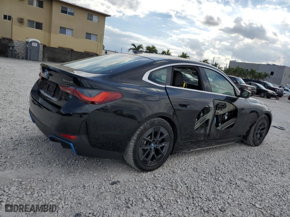 2023 BMW i4 eDrive40 with VIN WBY73AW00PFR11955, listed as a Copart auction lot 45920305 with 16,392 mi miles and Salvage Title. Bid and sale history available at carsss.com. Image 3.