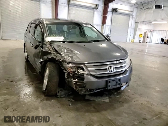 2012 Honda Odyssey Touring with VIN 5FNRL5H98CB028309, listed as a Copart auction lot 57663485 with 233,921 mi miles and Salvage title. Bid and sale history available at DreamBid. Image 14.