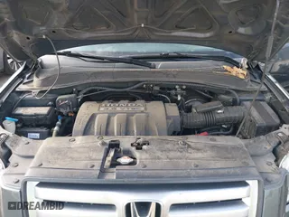 2006 Honda Pilot EX-L with VIN 2HKYF18536H538744, listed as a IAAI auction lot 42025277 with 203,012 mi miles. Bid and sale history available at carsss.com. Image 10.