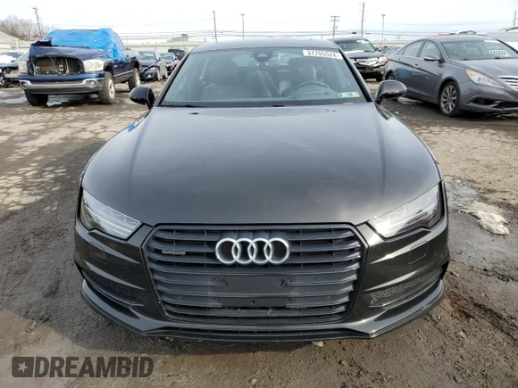 2016 Audi A7 3.0 Prestige with VIN WAU2GAFC5GN102061, listed as a Copart auction lot 37705524 with 70,842 mi miles. Bid and sale history available at carsss.com. Image 5.