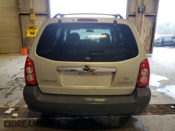 2006 Mazda Tribute i with VIN 4F2YZ02Z86KM02172, listed as a Copart auction lot 73214254 with 317,446 mi miles and Salvage Title. Bid and sale history available at DreamBid. Image 6.
