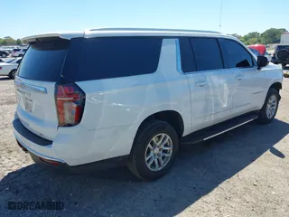2022 Chevrolet Suburban LT with VIN 1GNSKCKDXNR247122, listed as a IAAI auction lot 41837555 with 77,954 mi miles. Bid and sale history available at carsss.com. Image 4.