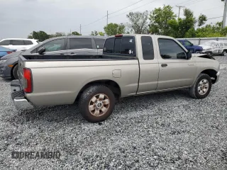 2000 Nissan Frontier XE z VIN 1N6DD26S6YC415423, wystawiony jako Copart lot #59086535 z przebiegiem 122 746 mil mil oraz Szkoda całkowita • Salvage title. Historia ofert i sprzedaży dostępna na DreamBid. Obrazek 3.