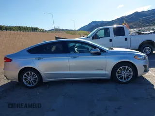 2019 Ford Fusion SE with VIN 3FA6P0LUXKR208139, listed as a IAAI auction lot 41820958 with 66,609 mi miles and . Bid and sale history available at DreamBid. Image 13.