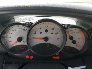 1999 Porsche Boxster with VIN WP0CA2987XU622760, listed as a Copart auction lot 59898355 with 104,425 mi miles and Salvage title. Bid and sale history available at DreamBid. Image 9.