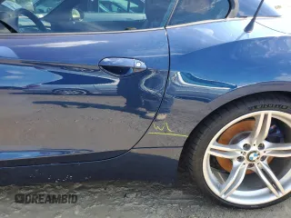 2011 BMW Z4 sDrive35is with VIN WBALM1C56BE393858, listed as a Copart auction lot 74249954 with 0 mi miles and Salvage Title. Bid and sale history available at carsss.com. Image 12.