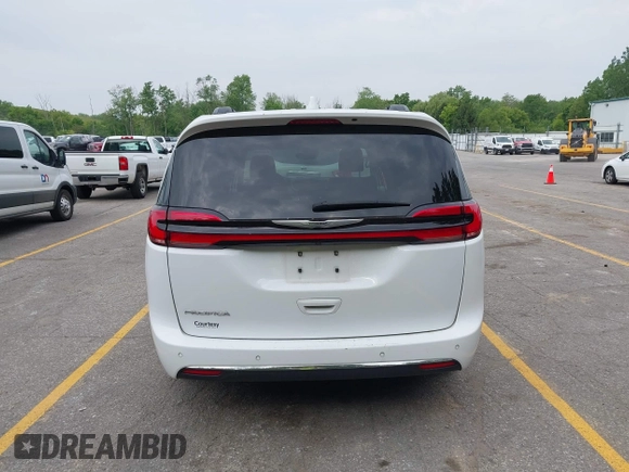 2022 Chrysler Pacifica Touring L with VIN 2C4RC1BG3NR149675, listed as a IAAI auction lot 42470593 with 59,956 mi miles and . Bid and sale history available at DreamBid. Image 16.