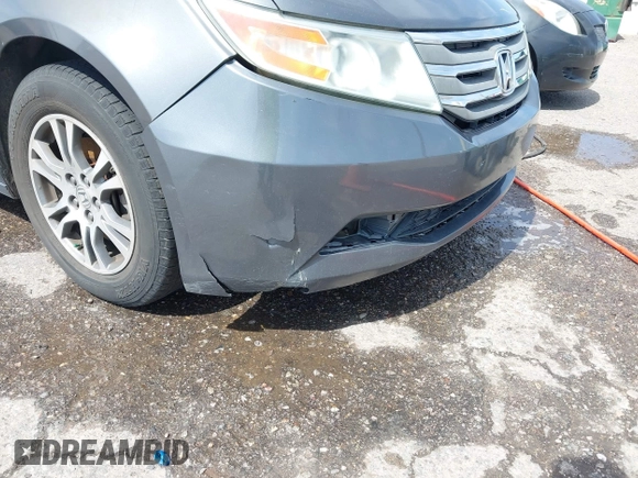 2011 Honda Odyssey EX-L with VIN 5FNRL5H68BB086943, listed as a IAAI auction lot 42503744 with 225,376 mi miles and . Bid and sale history available at DreamBid. Image 6.