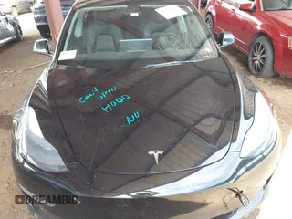 2022 Tesla Model 3 Long Range with VIN 5YJ3E1EB3NF257077, listed as a IAAI auction lot 42086629 with Not Provided miles and . Bid and sale history available at DreamBid. Image 10.