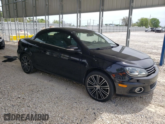 2013 Volkswagen Eos Komfort with VIN WVWBW8AH1DV001953, listed as a Copart auction lot 54167185 with 118,696 mi miles and Clean Title. Bid and sale history available at DreamBid. Image 4.