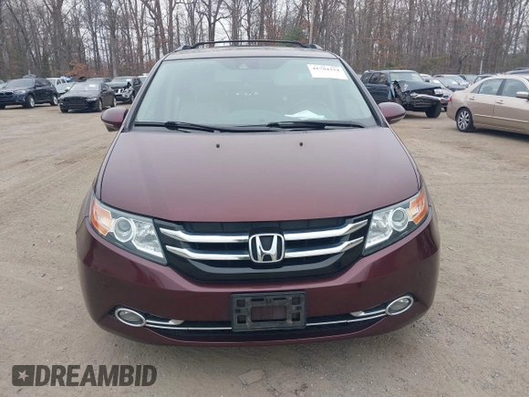 2014 Honda Odyssey Touring with VIN 5FNRL5H97EB117971, listed as a IAAI auction lot 41794324 with 198,191 mi miles and . Bid and sale history available at DreamBid. Image 12.