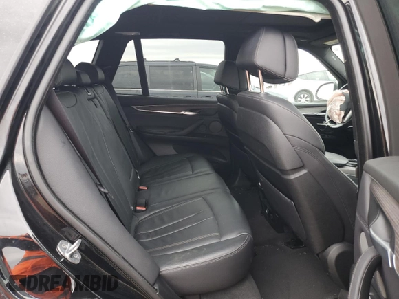 2017 BMW X5 xDrive35i z VIN 5UXKR0C30H0V79585, wystawiony jako Copart lot #50623685 z przebiegiem 117 741 mil mil oraz Szkoda całkowita • Salvage title. Historia ofert i sprzedaży dostępna na DreamBid. Obrazek 11.