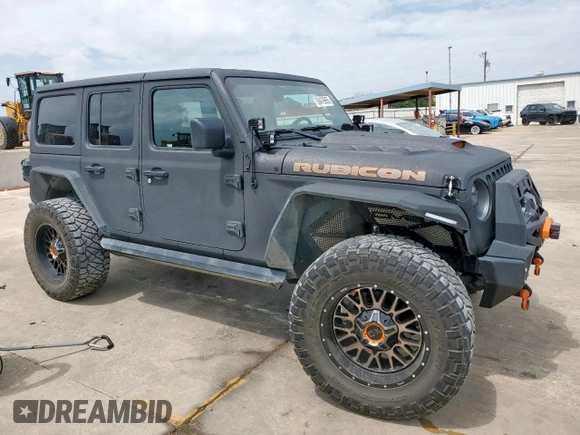 2021 Jeep Wrangler Unlimited Rubicon with VIN 1C4HJXFG5MW542260, listed as a Copart auction lot 59476655 with 19,870 mi miles and Salvage title. Bid and sale history available at DreamBid. Image 4.