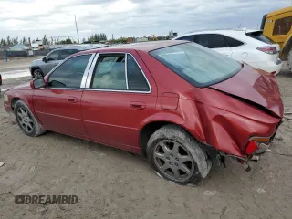 2002 Cadillac Seville Touring STS z VIN 1G6KY54902U132357, wystawiony jako Copart lot #42008795 z przebiegiem 111 014 mil mil oraz Szkoda całkowita • Salvage title. Historia ofert i sprzedaży dostępna na DreamBid. Obrazek 2.