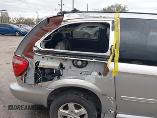 2005 Dodge Caravan SXT with VIN 2D4GP44L85R207743, listed as a IAAI auction lot 41651028 with 56,754 mi miles and . Bid and sale history available at carsss.com. Image 6.