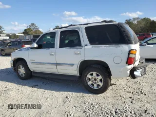 2005 GMC Yukon SLE with VIN 1GKEC13T15J230550, listed as a Copart auction lot 77214624 with 203,095 mi miles and Salvage Title. Bid and sale history available at carsss.com. Image 2.