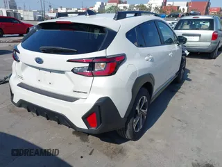 2024 Subaru Crosstrek Premium z VIN JF2GUADC2R8336410, wystawiony jako IAAI lot #42385768 z przebiegiem 22 126 mil mil oraz . Historia ofert i sprzedaży dostępna na DreamBid. Obrazek 4.