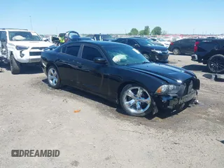 2014 Dodge Charger SE with VIN 2C3CDXBG7EH328575, listed as a IAAI auction lot 41998842 with 73,962 mi miles and . Bid and sale history available at carsss.com. Image 1.