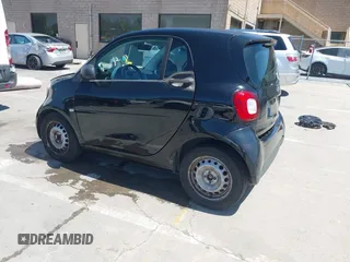 2016 Smart fortwo Passion with VIN WMEFJ5DA7GK068111, listed as a IAAI auction lot 42260953 with 87,115 mi miles and . Bid and sale history available at DreamBid. Image 3.