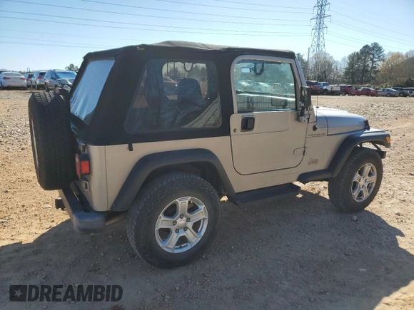 2001 Jeep Wrangler SE with VIN 1J4FA29P11P334902, listed as a Copart auction lot 83883654 with 157,827 mi miles and Salvage Title. Bid and sale history available at carsss.com. Image 3.