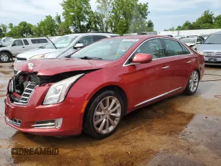 2013 Cadillac XTS Luxury with VIN 2G61P5S33D9121169, listed as a Copart auction lot 56491273 with 125,323 mi miles and Salvage title. Bid and sale history available at DreamBid. Image 1.