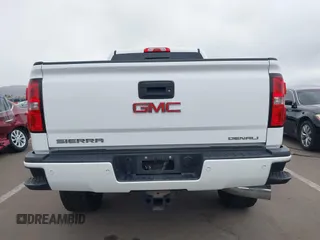 2016 GMC Sierra 2500HD Denali z VIN 1GT12UE89GF172877, wystawiony jako IAAI lot #41807741 z przebiegiem 36 719 mil mil oraz . Historia ofert i sprzedaży dostępna na DreamBid. Obrazek 16.