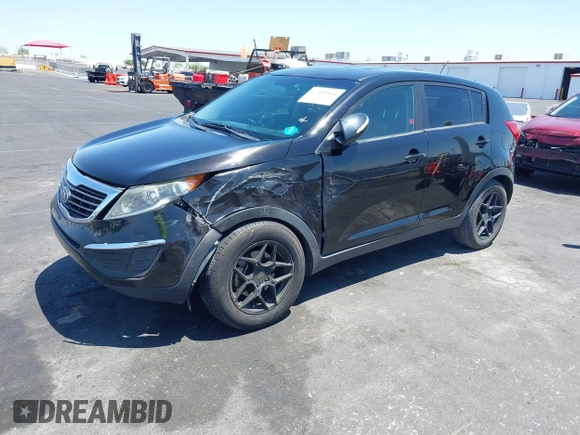 2013 Kia Sportage LX with VIN KNDPBCA25D7449584, listed as a IAAI auction lot 42489414 with 100,993 mi miles and . Bid and sale history available at DreamBid. Image 2.