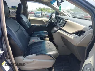 2015 Toyota Sienna LE AAS with VIN 5TDKK3DC1FS642029, listed as a IAAI auction lot 42618738 with 201,344 mi miles and . Bid and sale history available at DreamBid. Image 5.