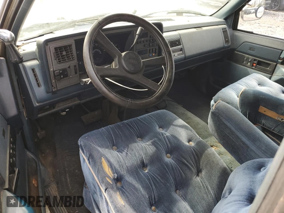 1989 GMC Sierra 1500 with VIN 2GTHC39K3K1532298, listed as a Copart auction lot 51497065 with 233,797 mi miles and Salvage Title. Bid and sale history available at DreamBid. Image 8.
