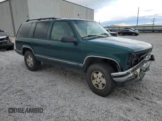 1996 GMC Yukon with VIN 1GKEK13R6TJ747606, listed as a Copart auction lot 80763434 with 308,837 mi miles and Salvage Title. Bid and sale history available at carsss.com. Image 4.