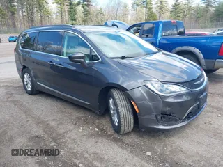 2017 Chrysler Pacifica Touring L with VIN 2C4RC1BGXHR667397, listed as a IAAI auction lot 42085117 with 63,996 mi miles and . Bid and sale history available at DreamBid. Image 1.